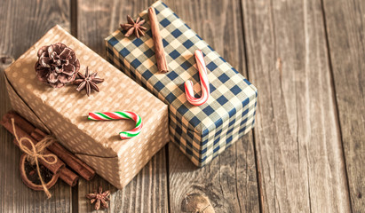 Christmas gift boxes on wooden background
