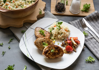 Pork medallions with grilled vegetables and vegetable couscous. Excellent food