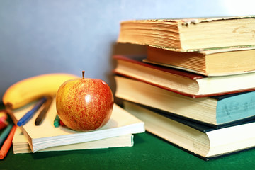 grunge effect photo education book stack apple pen