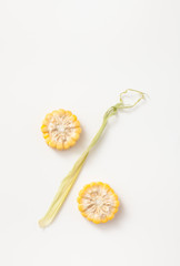 Two slices ear of corn in form of a percent sign