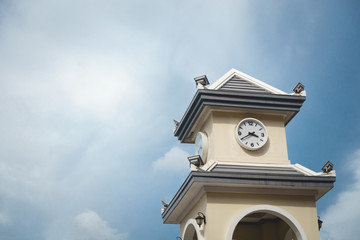 Fototapeta na wymiar clock tower asian style with blue sky background, bangkok, thailand
