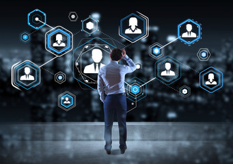 Businessman watching social network interface on a rooftop 3D rendering