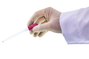 Chemist hand holding a pipette dropping with emerging drop of chemical solution isolated on white background