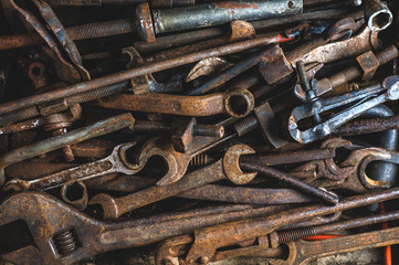 Background of old rusty tools. The concept of workshop or repair