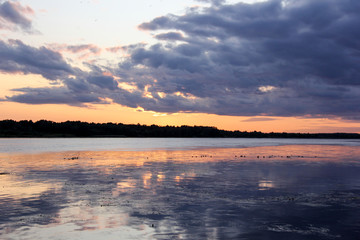 Obraz premium summer sunset in Latvia on river Daugava.