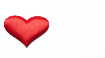 Red heart on white background. Isolated. Copy spae.