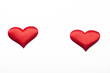 Two red hearts on white background. Isolated.