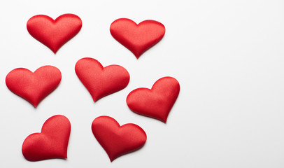 Various red hearts on white background. Isolated. Copy space.