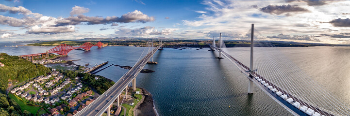 The new Queensferry Crossing bridge (on the right) over the Firth of Forth with the older Forth...