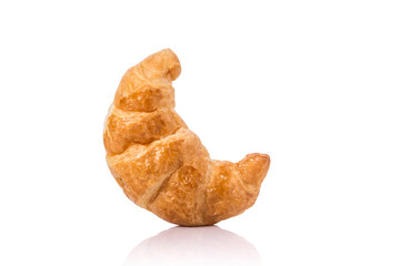 Fresh Croissant. Studio shot isolated on white background. Junk food, obesity or food healthy concept