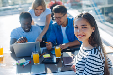 Female student smiling for camera