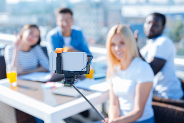 Students taking self portrait on terrace