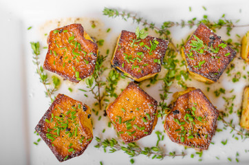 Potato fondant with garlic and herbs