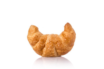 Fresh Croissant. Studio shot isolated on white background. Junk food, obesity or food healthy concept