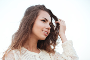 Fototapeta premium Close up portrait of young beautiful woman with long hair