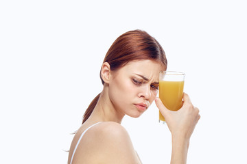 Woman holding a glass of juice