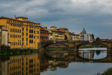 Fototapeta na wymiar Bridge over Arno river in Florence, Italy.