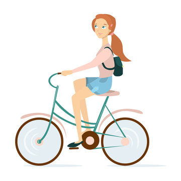 Woman rides bicycle.