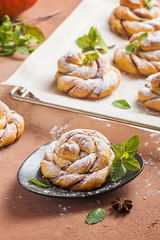 Homemade cinnamon buns with pumpkin