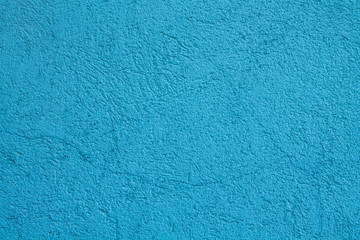 Fototapeta na wymiar Wall background, blue colored texture