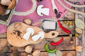 Pieces of white mushrooms, peppers and spices