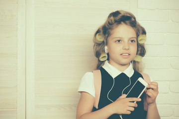 Kid choose career and listen music.