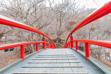 A red bridge in Ikaho Onsen on autumn is a hot spring town located on the eastern slopes of Mount Haruna   , famous place  of Gunma Prefecture,Japan.