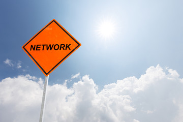 network on road sign in blue sky