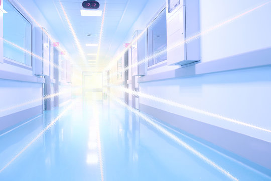 Hospital hall lightened by a flashing light