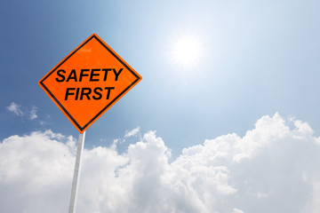 orange diamond traffic sign safety in blue sunny sky