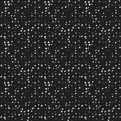 Randomly placed dots seamless vector pattern. Hand drawn speckles and spots decorative texture. Background for print, textile, fabric, wallpaper, card, poster, home decor, packaging, wrapping.