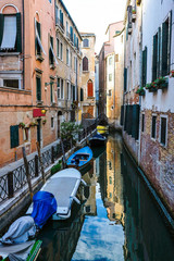 Fototapeta na wymiar Venice, Italy - July, 28, 2017: Channel in Venice, Italy