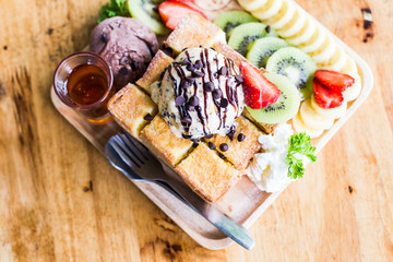 Honey Toast. Bread buttered toast and with fruit.