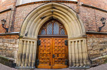 Obraz premium Entrance to the medieval church of Saint John in Riga, Latvia, Europe