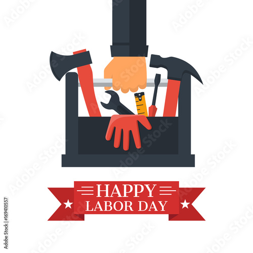 "Happy Labor day, concept. Toolbox with tools in hands of builder. Hand