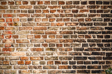 The texture of a brick wall covered with black soot after a fire. You can use it as a background...