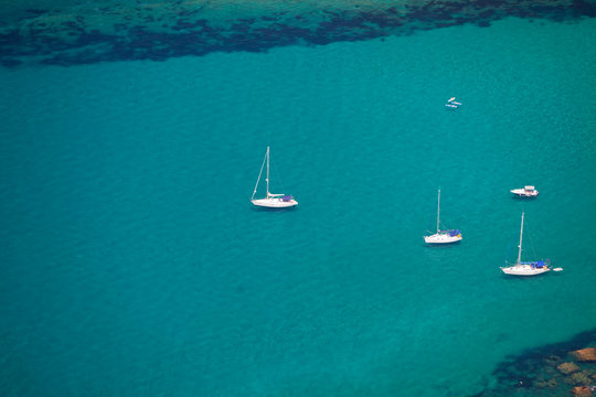 Fototapeta Turquoise sea and white yachts
