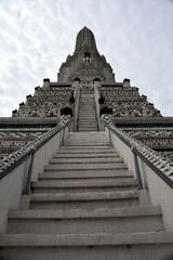 Stairway to Wat Arun (Temple of Dawn) pagoda most popular religious traveling destination in Bangkok Thailand.