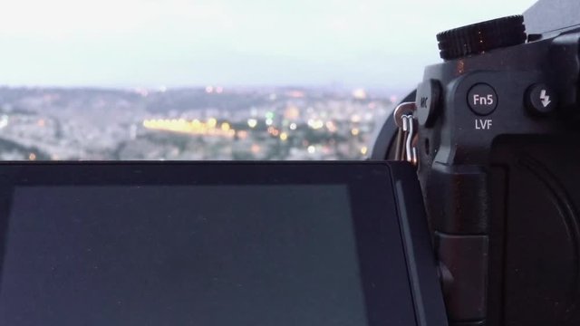 Camera shoots photo timelapse of the Jerusalem Old City view landscape. Mount Scopus is a famous Holy Land place and it has a fantastic view to the Old Jerusalem.