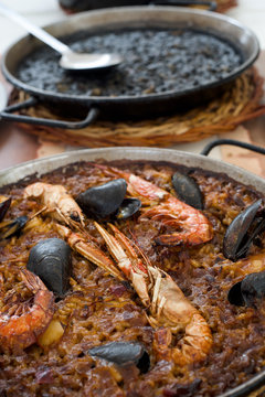 spanish seafood paella and black paella