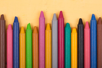 colored crayons on the desk