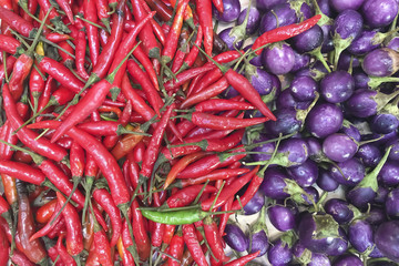 Red Chili and eggplant background on local market.