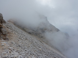 mountaineering on Tofana ridge in dolomites
