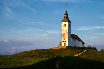 Fototapeta premium Church at Krizna gora hill near Skofja Loka.