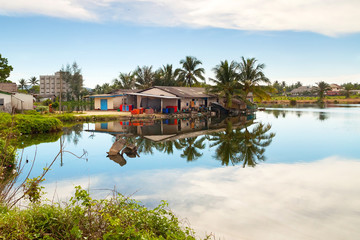 Obraz premium Small village house at the river in Thailand