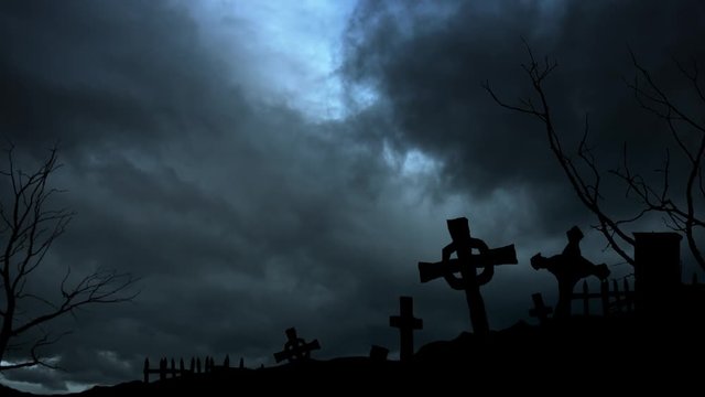 Sinister view - night cemetery, stormy sky and lightning