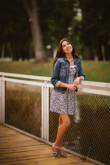 Beautiful young girl on the waterfront