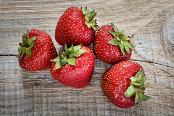 strawberries on wooden background