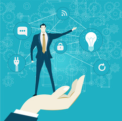  Human hand holding businessmen in front of the communication and business icons. Concept illustration 