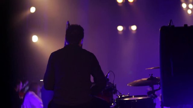 The musician plays the drums